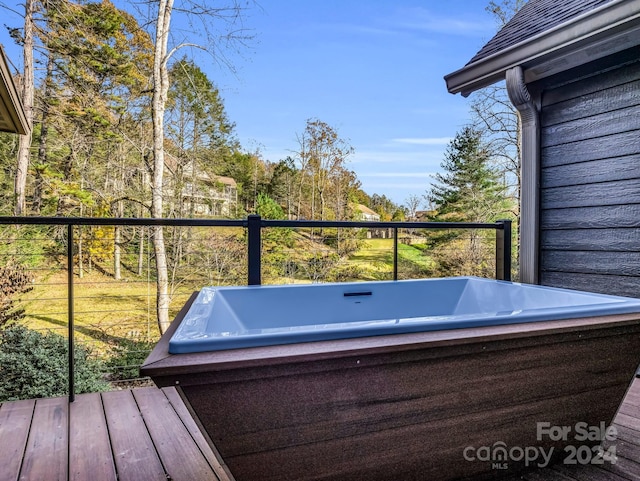 268 Firefly Cv, Lake Lure, NC 28746 - wooden terrace with an outdoor hot tub