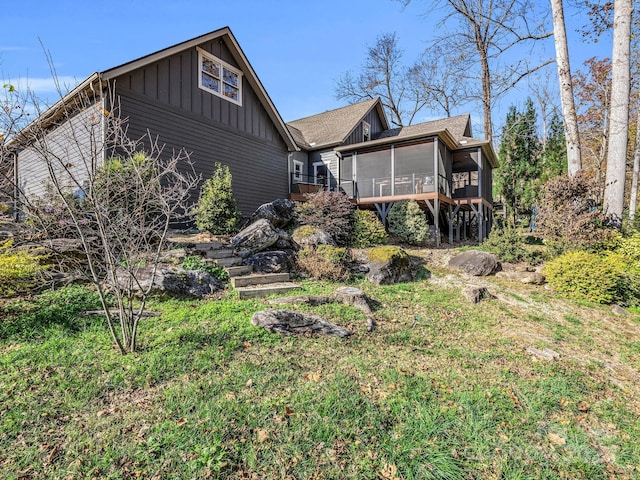 268 Firefly Cv, Lake Lure, NC 28746 - back of property with a sunroom and board and batten siding