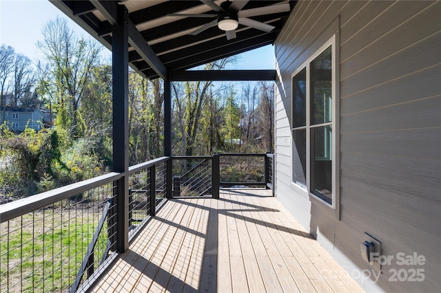 wooden deck with ceiling fan