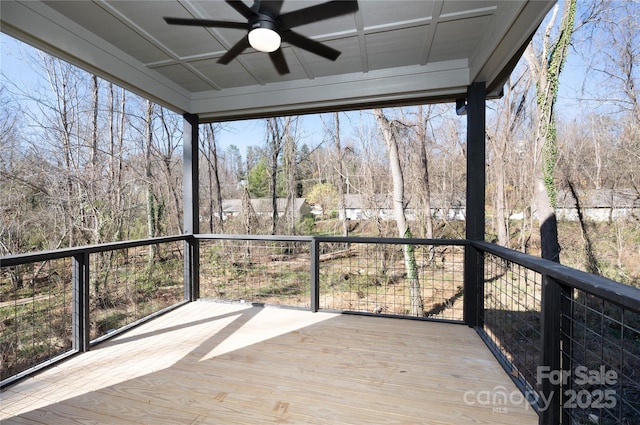 wooden terrace with ceiling fan