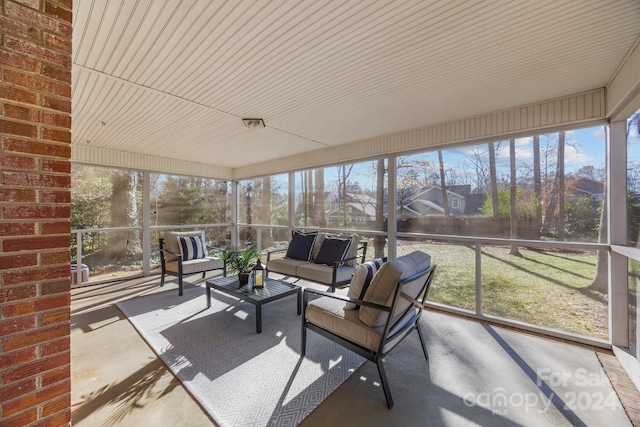 sunroom featuring a healthy amount of sunlight