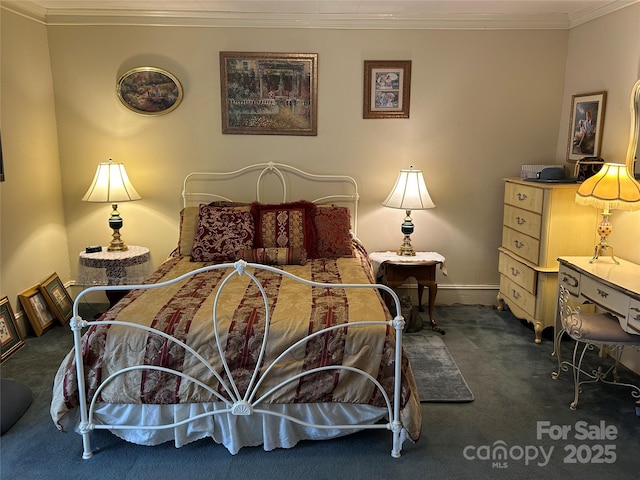 carpeted bedroom featuring crown molding