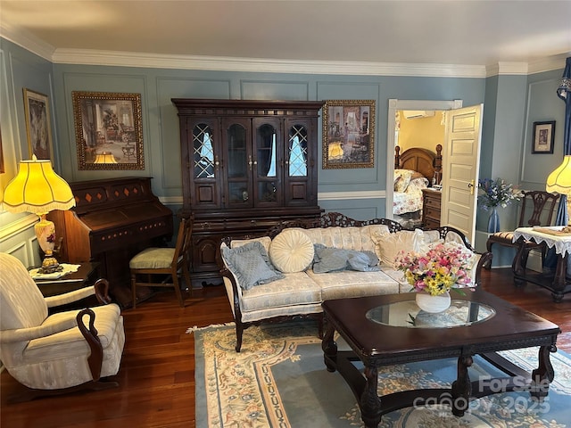 living room featuring ornamental molding and dark hardwood / wood-style flooring