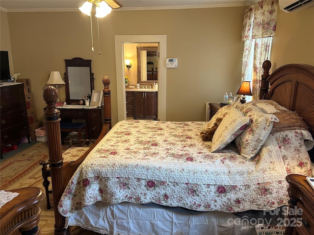 bedroom with crown molding, a wall mounted AC, ceiling fan, and ensuite bath