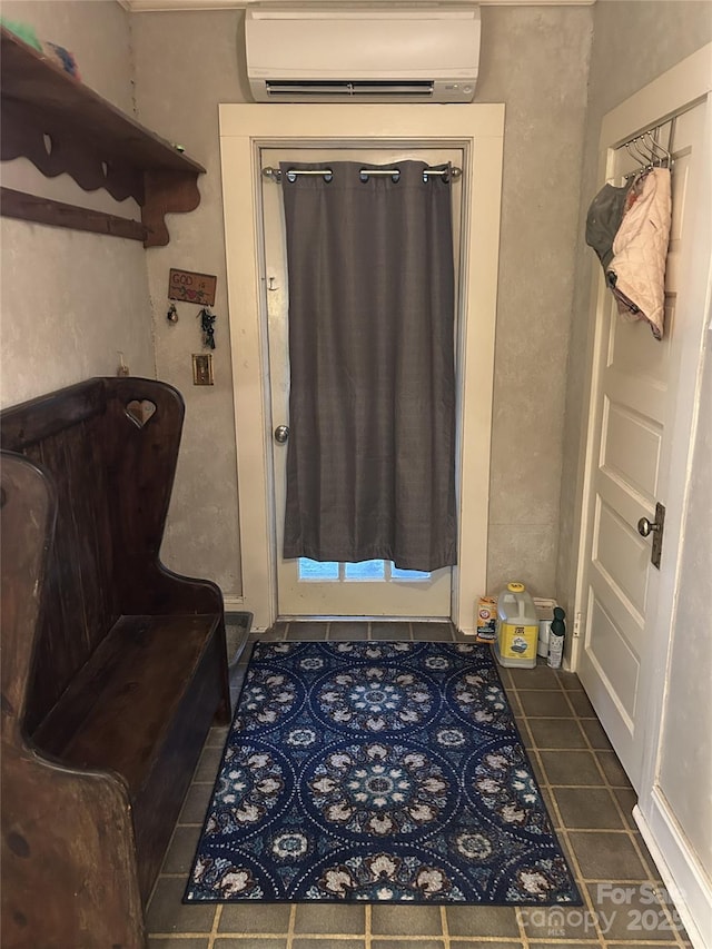 bathroom featuring tile patterned floors and a wall mounted AC