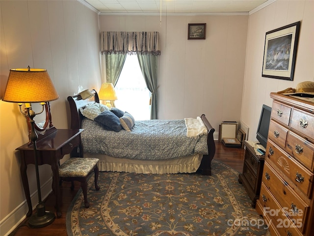 bedroom featuring dark hardwood / wood-style flooring, crown molding, and wood walls