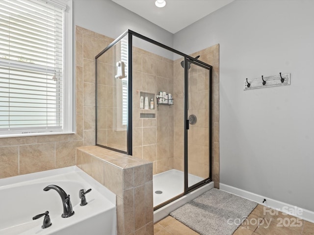 bathroom featuring tile patterned floors and plus walk in shower