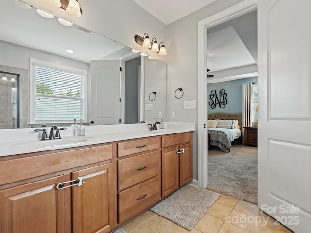 bathroom featuring vanity, tile patterned floors, and ceiling fan