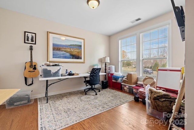 office area with wood-type flooring