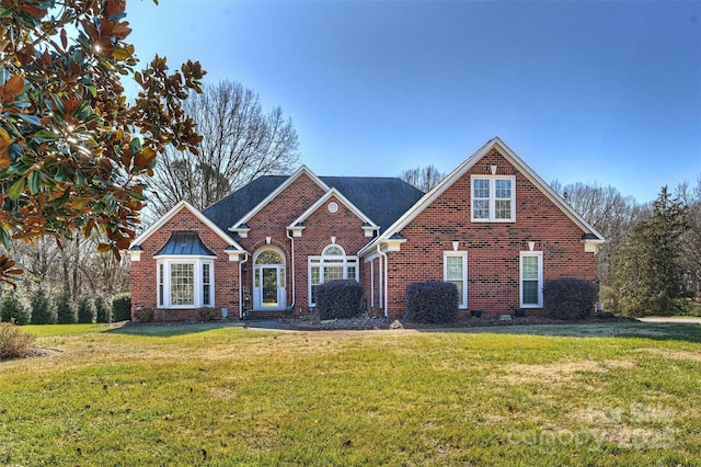 view of front property with a front yard