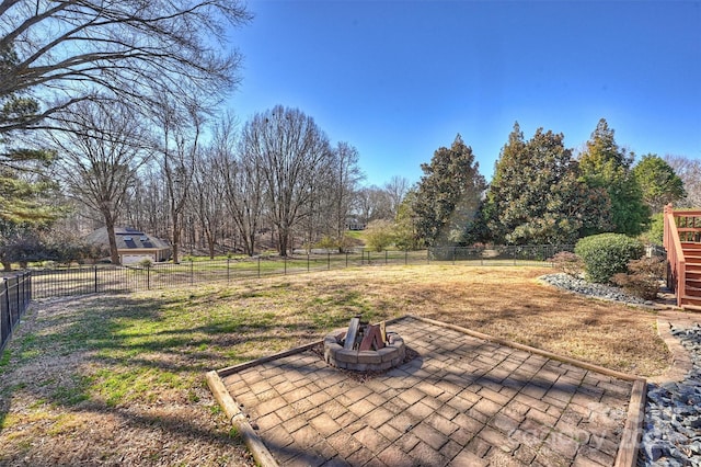 view of patio featuring a fire pit