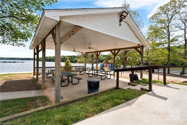 view of property's community featuring a gazebo and a water view