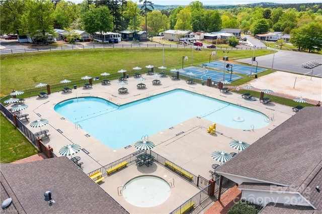 view of swimming pool with a patio area