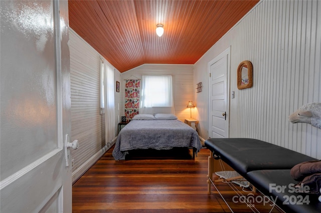 bedroom with wood ceiling, dark wood-type flooring, and vaulted ceiling