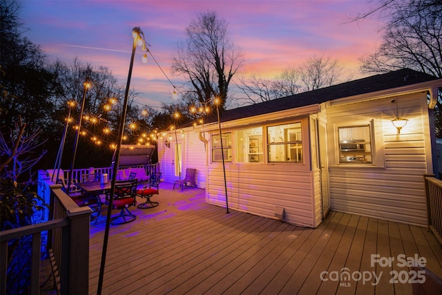 view of deck at dusk