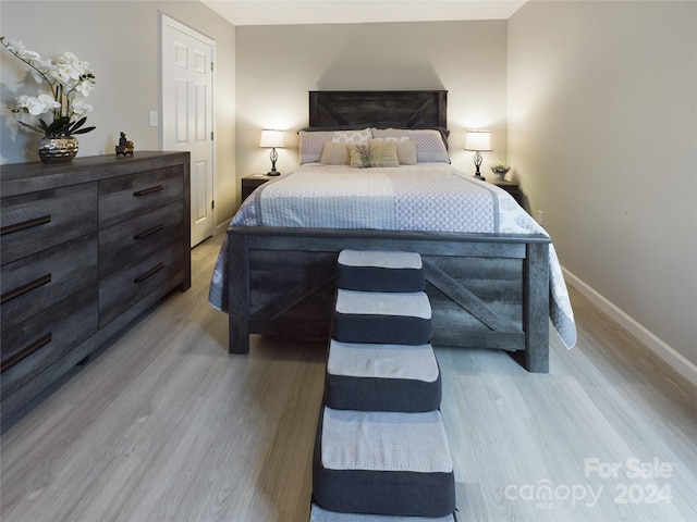 bedroom featuring light hardwood / wood-style flooring