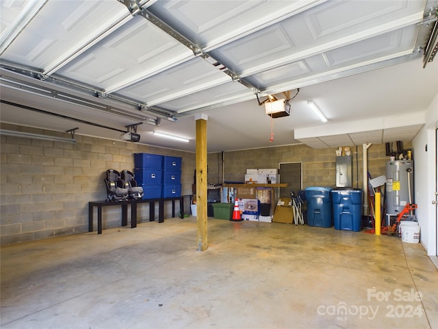 garage with electric panel, electric water heater, and a garage door opener