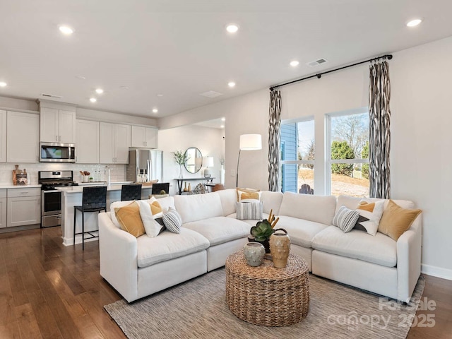 living room featuring hardwood / wood-style flooring