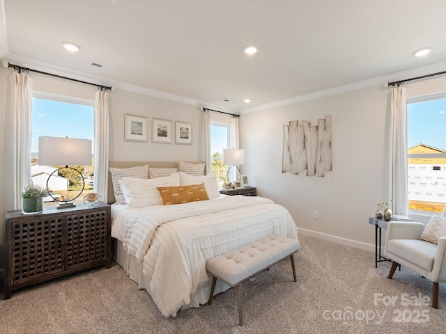 bedroom featuring carpet, crown molding, and multiple windows