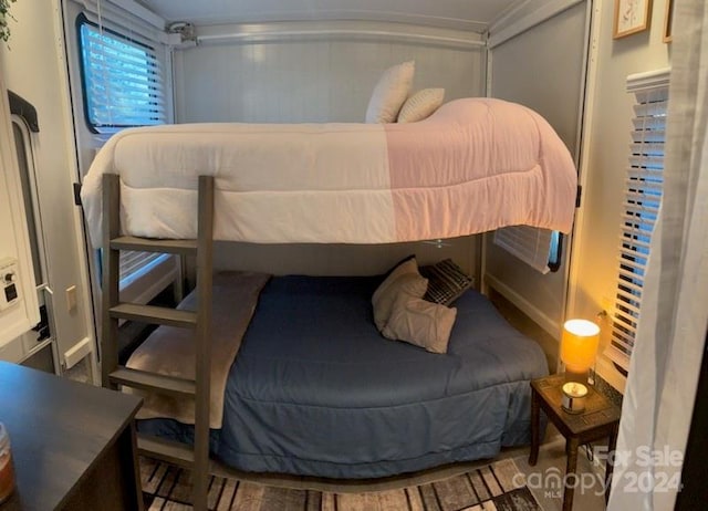 bedroom featuring hardwood / wood-style flooring