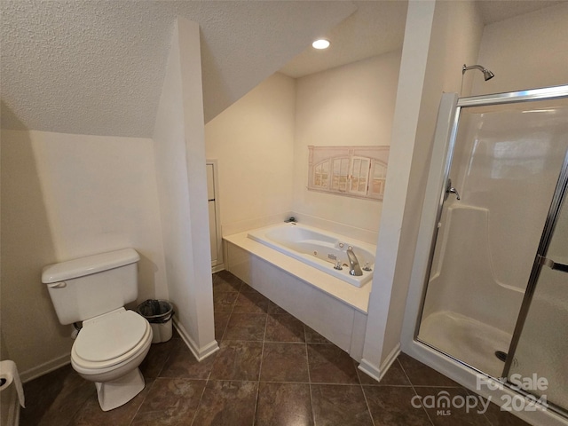 bathroom with a textured ceiling, toilet, shower with separate bathtub, and tile patterned floors