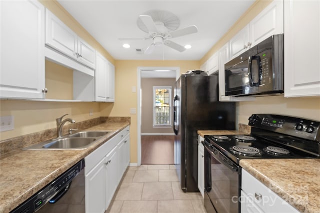 kitchen with ceiling fan, white cabinetry, sink, light tile patterned flooring, and appliances with stainless steel finishes