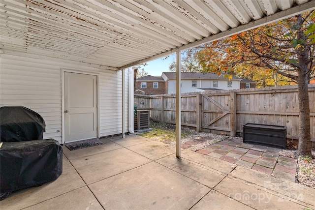 view of patio / terrace featuring central AC and a grill