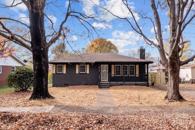 ranch-style house with covered porch