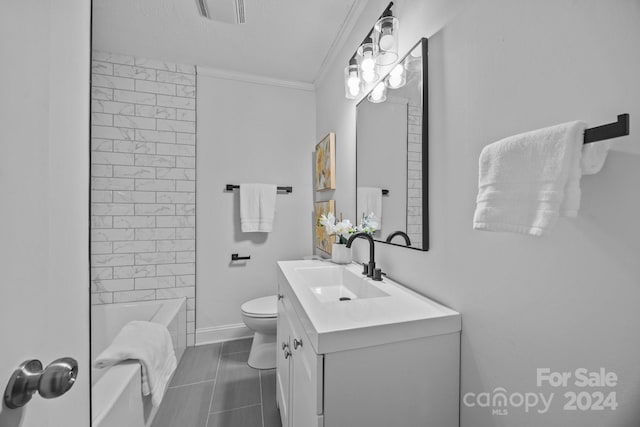 full bathroom with vanity, tile patterned flooring, tiled shower / bath combo, toilet, and ornamental molding