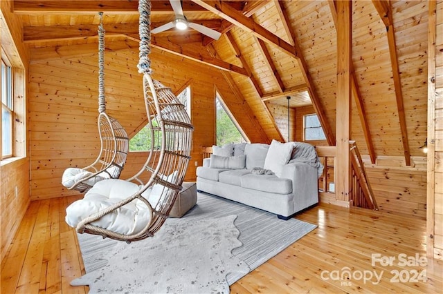 552 Lake Rd, Old Fort, NC 28762 - living room with wood ceiling, plenty of natural light, wooden walls, hardwood / wood-style floors, and a ceiling fan