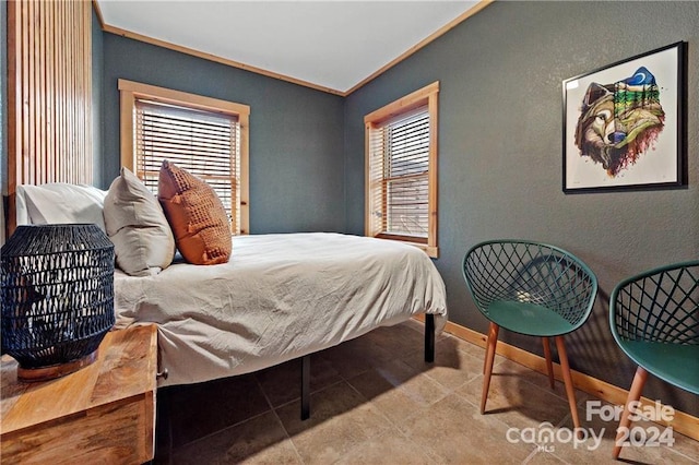 tiled bedroom with crown molding