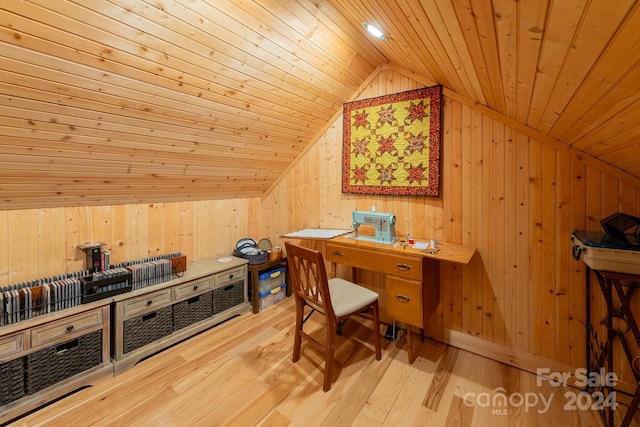 office with lofted ceiling, wood ceiling, wooden walls, and light hardwood / wood-style flooring