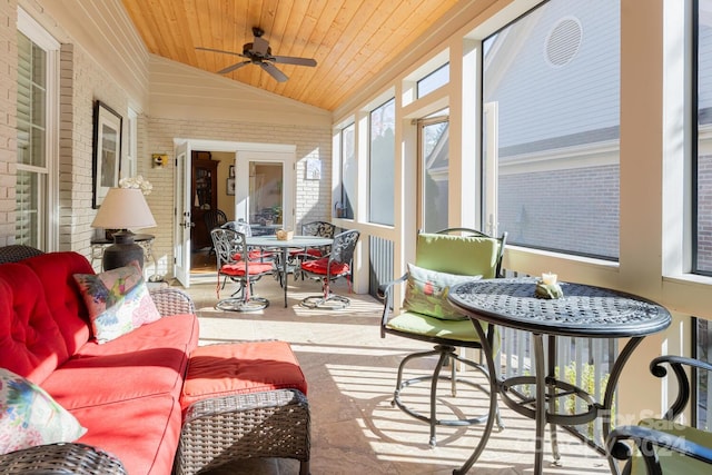 sunroom / solarium with wooden ceiling, ceiling fan, and lofted ceiling