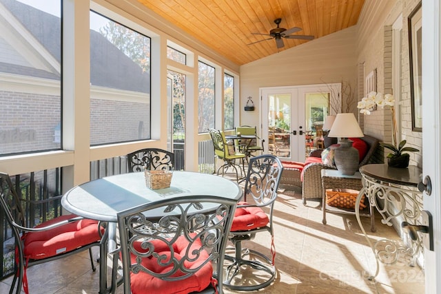 sunroom / solarium with a healthy amount of sunlight, french doors, lofted ceiling, and wood ceiling