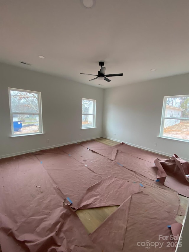 empty room featuring ceiling fan