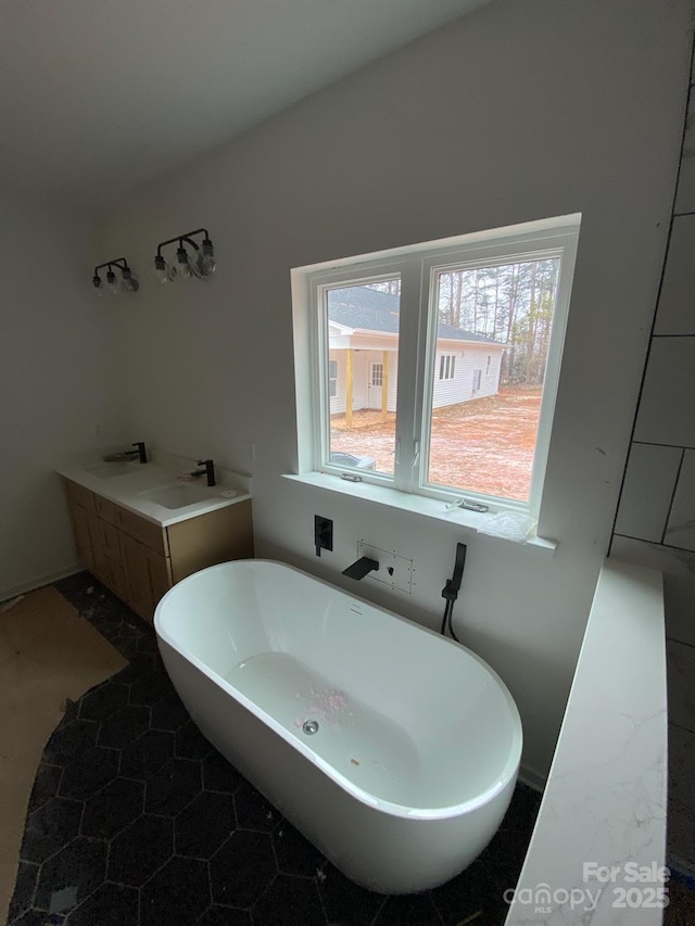 bathroom featuring a washtub