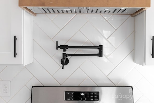 interior details featuring white cabinets