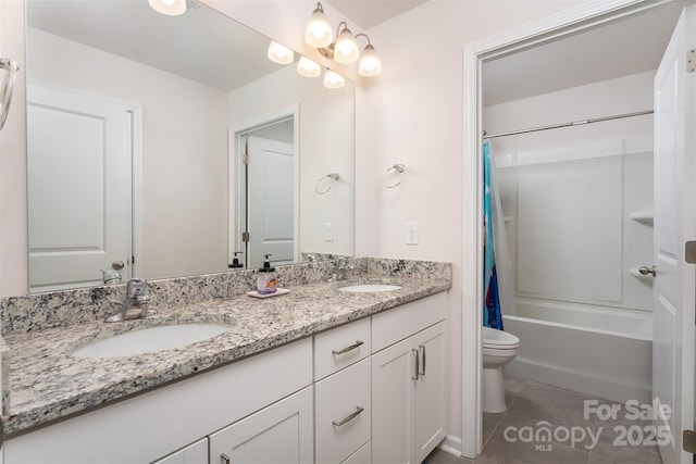 full bathroom featuring tile patterned flooring, shower / tub combo, vanity, and toilet