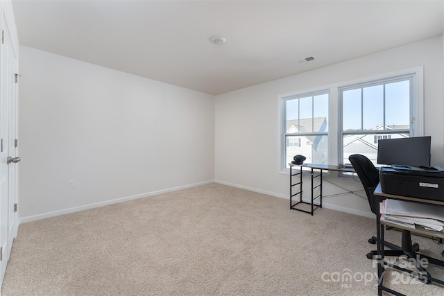 view of carpeted home office