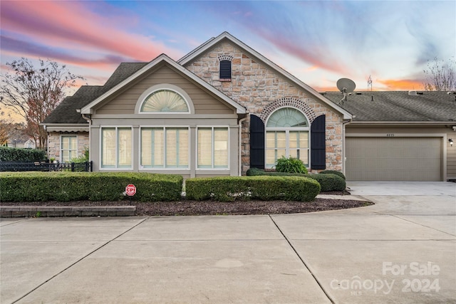 view of front of house with a garage