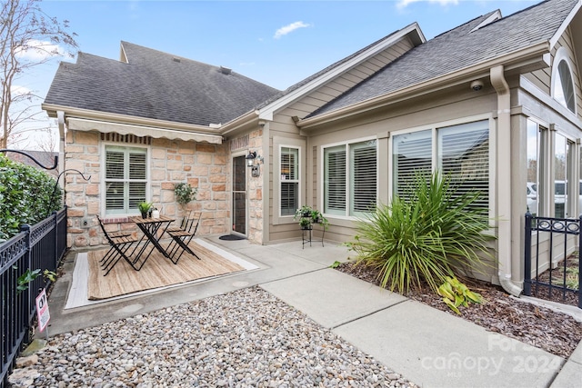 back of house with a patio area