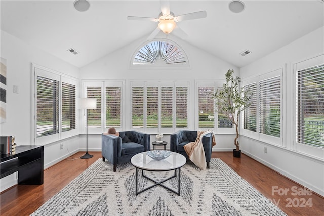 sunroom / solarium with a healthy amount of sunlight and lofted ceiling