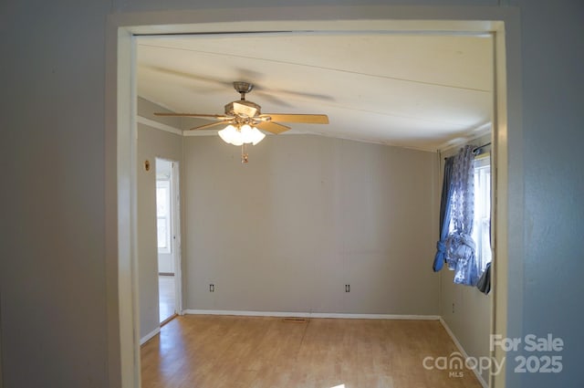 unfurnished room with light hardwood / wood-style flooring and ceiling fan