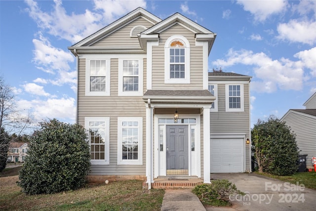 front facade with a garage