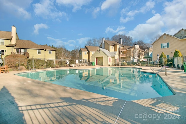 view of pool featuring a patio area