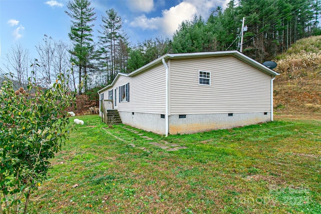 view of property exterior featuring a yard