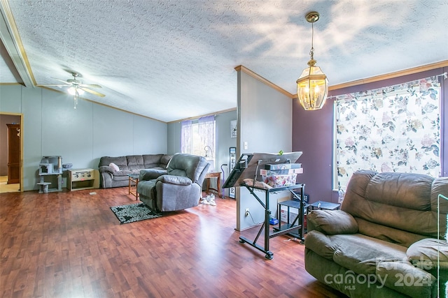 living room featuring wood-type flooring, a textured ceiling, and lofted ceiling