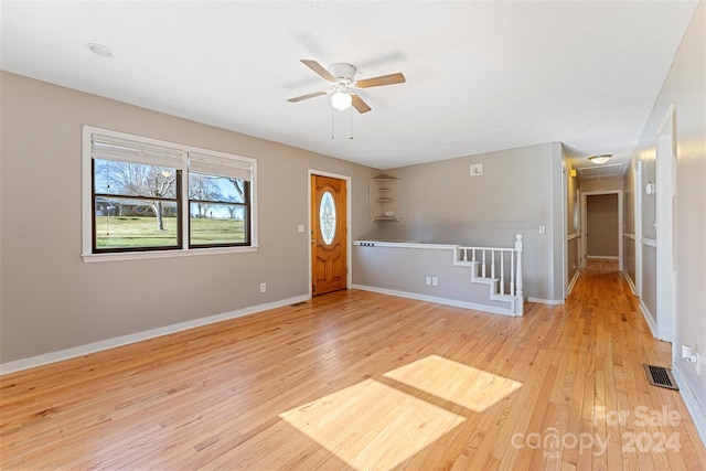 interior space with light hardwood / wood-style floors and ceiling fan