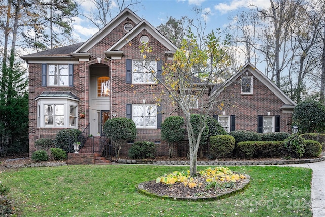 view of property with a front lawn