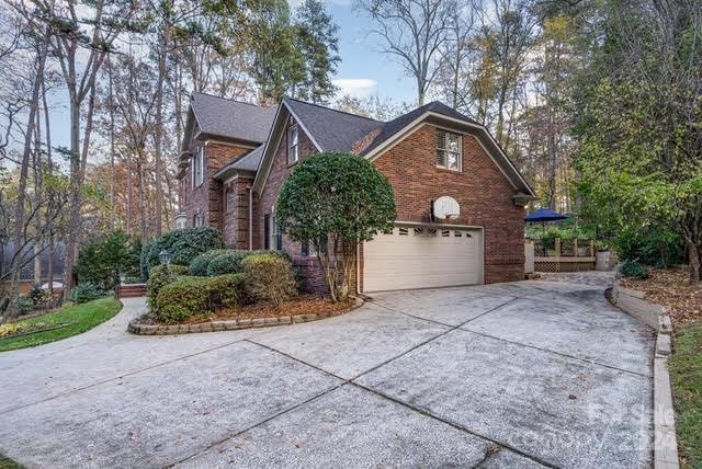 view of side of property featuring a garage